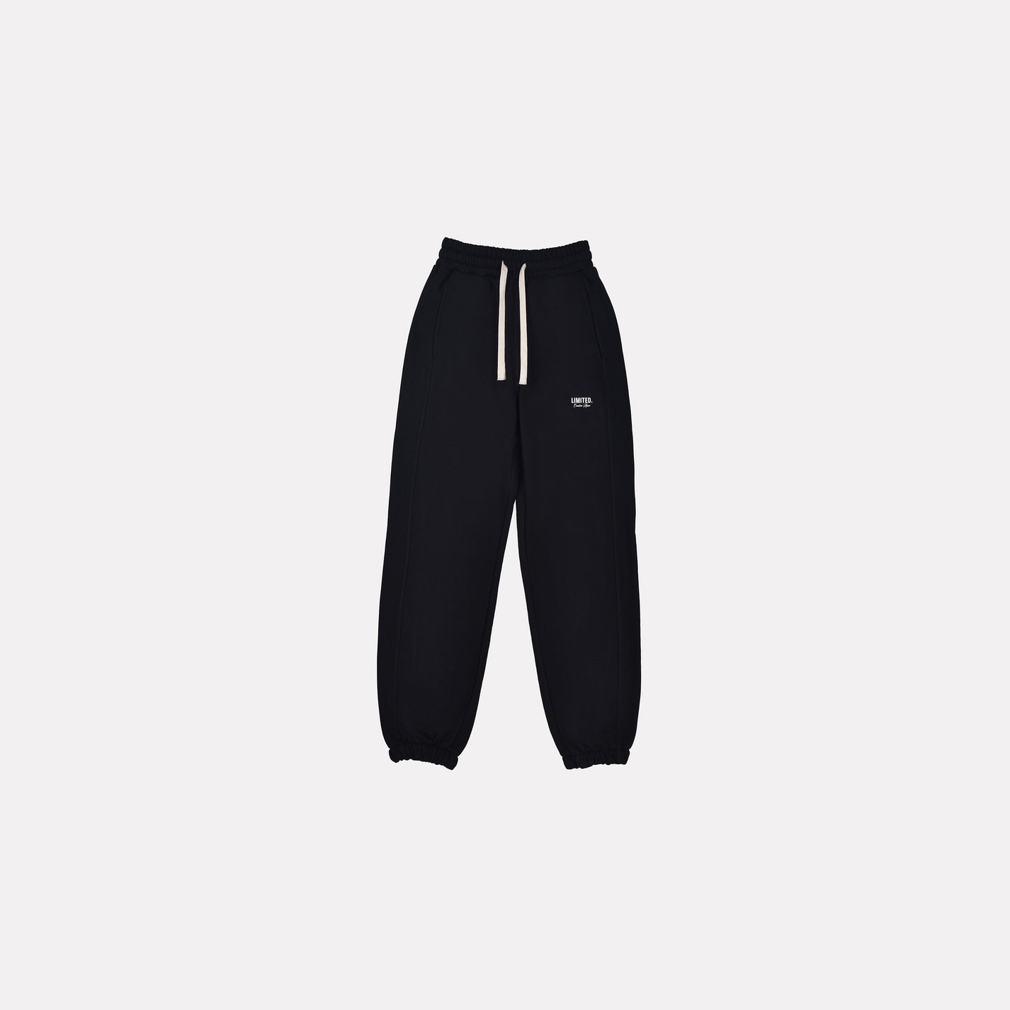 LIMITED. mens black joggers minimalistic front view, featuring off-white drawstrings and screen printed branding.